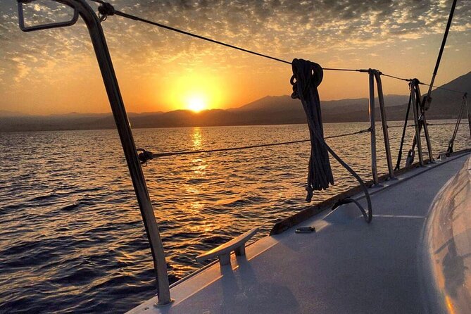 Marbella Small Group Catamaran with Dolphin Watching - The return ride, drinks, and your own music
