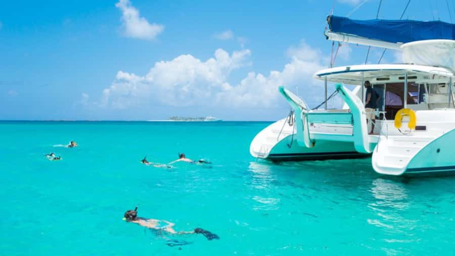 Mauritius: Ile aux Cerf Catamaran w/Waterfall Visit & Lunch - Snorkeling in clear lagoon water