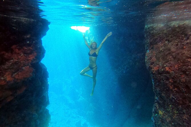 Milos caves snorkelling Catamaran Cruise in a small group - Agios Dimitrios offers a quiet final swim