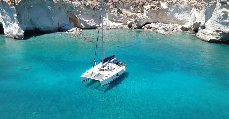 Milos: Full-Day Catamaran Cruise with Paddle Board - From Adamantas to the old fishing villages