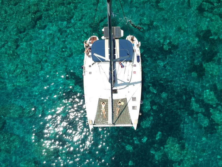 Milos: Full-Day Catamaran Cruise with Paddle Board - Cape Vani and the first swim at Kalogries