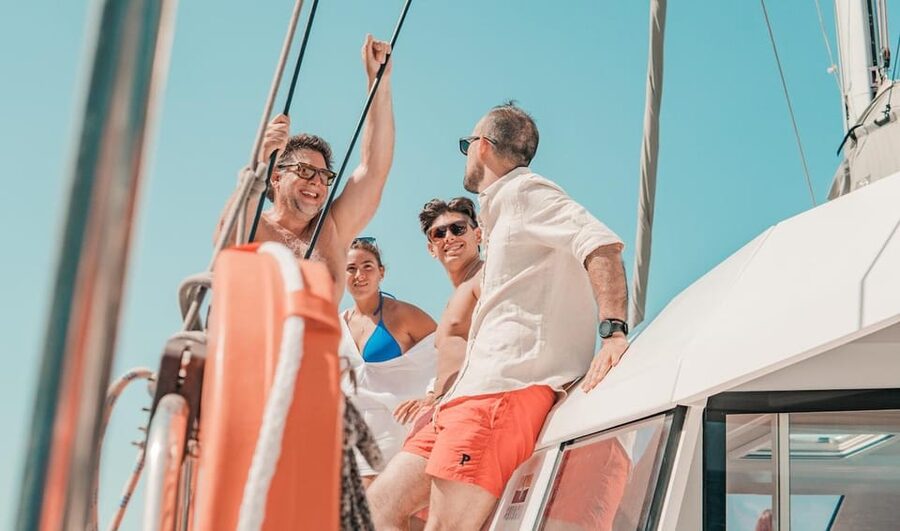 Milos: Full Day Luxury Catamaran with Full Meal & Open Bar - Lunch with the catamaran as your dining room