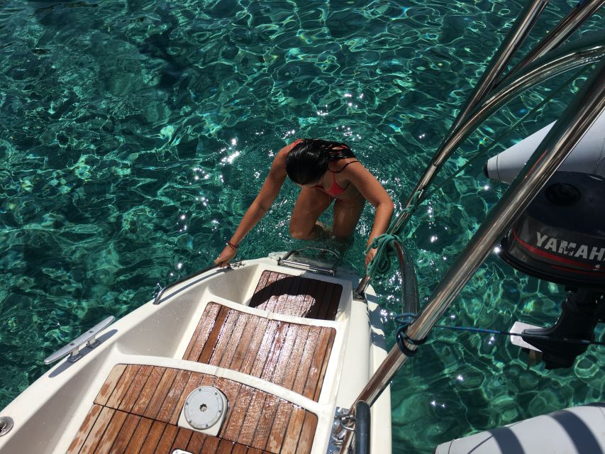 Milos: Half-Day Morning Catamaran Cruise to Kleftiko - Greek lunch, fruit, dessert, and drinks onboard