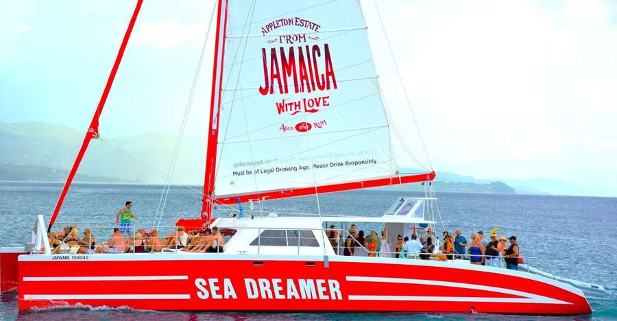 Montego Bay Catamaran Cruise and Snorkeling Tour - Setting out along the Montego Bay coastline