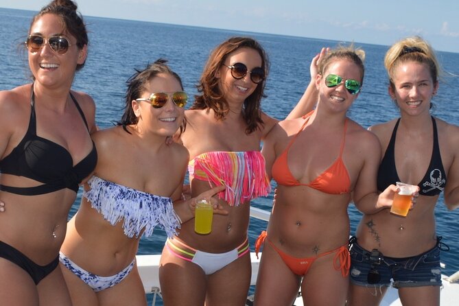 Montego Bay Catamaran: Snorkel Tour with Open Bar & Reggae DJ - The foot massage and small extras