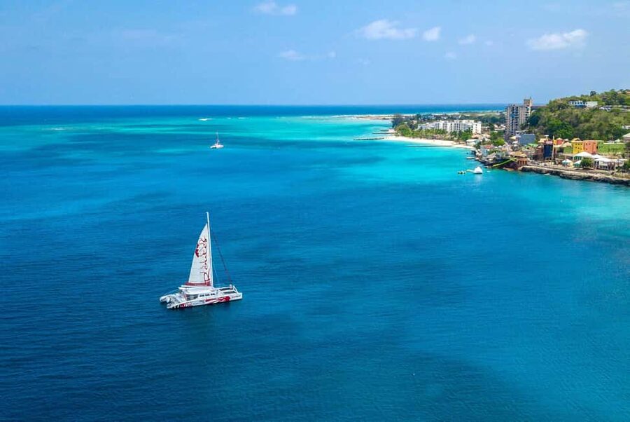 Montego Bay: Reggae Catamaran 18+ Cruise with Open Bar - Hotel pickup and the start of the three-hour outing