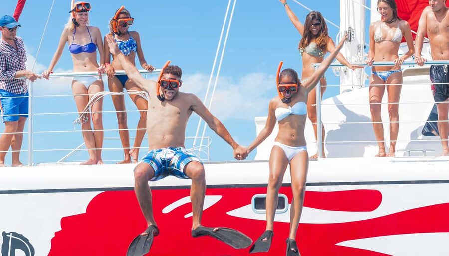 Montego Bay: Reggae Family Catamaran Cruise with Snorkeling - Setting out from Montego Bay on a family catamaran