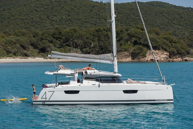 Mykonos: Brand-New Catamaran Cruise with Meal, Drinks & Transport - Getting aboard at Agia Anna beach