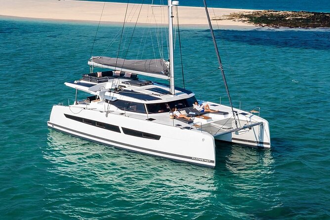 Mykonos: Luxury Catamaran Cruise with Meal, Drinks & Transport - Rhenia gives the cruise its quiet side