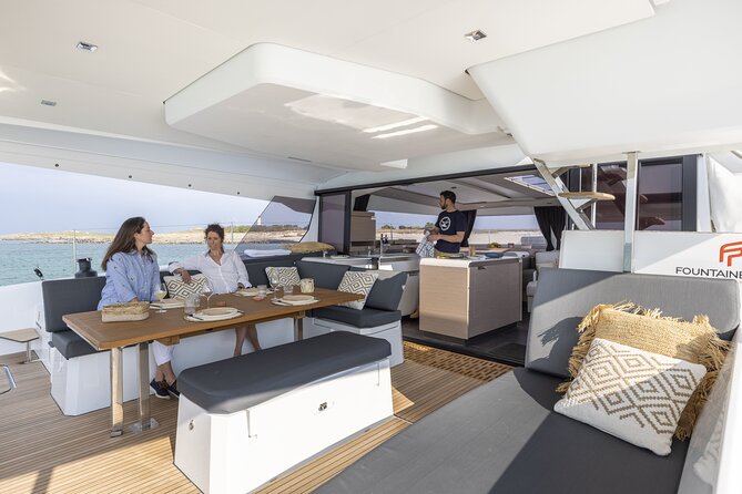 Mykonos: Luxury Catamaran Cruise with Meal, Drinks & Transport - Lunch and drinks keep the day simple