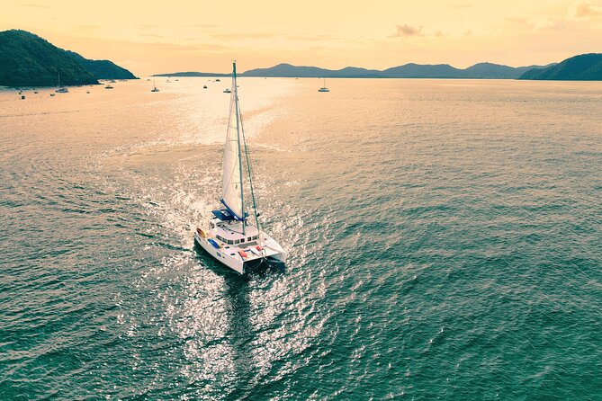 Mykonos: Private Catamaran Cruise—Hotel Pickup, BBQ & Drinks - Delos, Apollo, and the ancient Cyclades