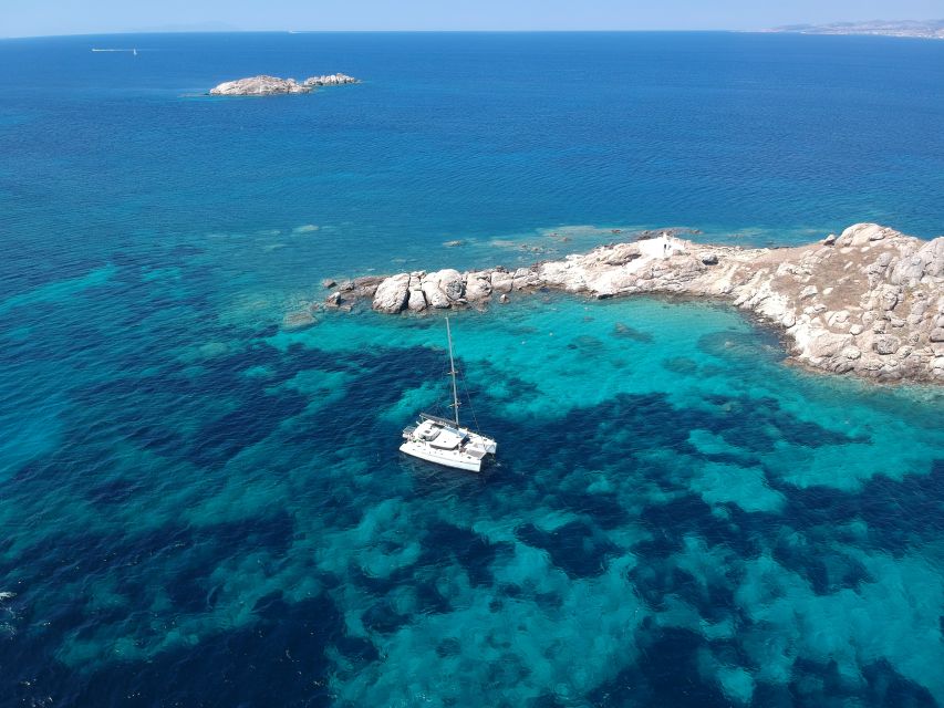 Naxos: Luxury Catamaran Day Trip with Lunch and Drinks - Swimming and snorkeling in secluded coves