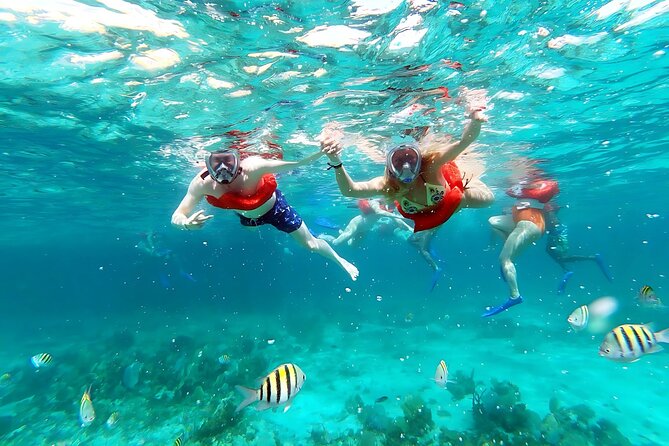 Negril Catamaran Morning Sail with Snorkeling & Pirate’s Cave - Drinks, Jamaican snacks, and the onboard mood