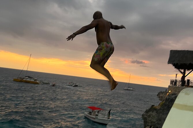 Negril Private Day Tour: ATV Ride, Party Catamaran & Ricks Cafe - Seven Mile Beach and the start of the catamaran