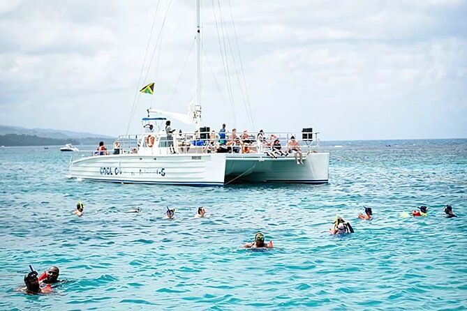 Ocho Rios Catamaran: Dunn's River Falls, Snorkeling & Open Bar - Climbing the 900-foot Dunn’s River Falls