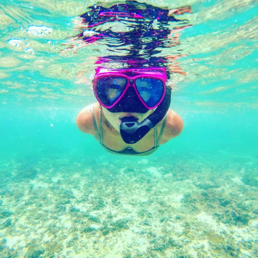 Onna: Blue Cave Snorkeling from Catamaran - A short stop at Zanehama Beach