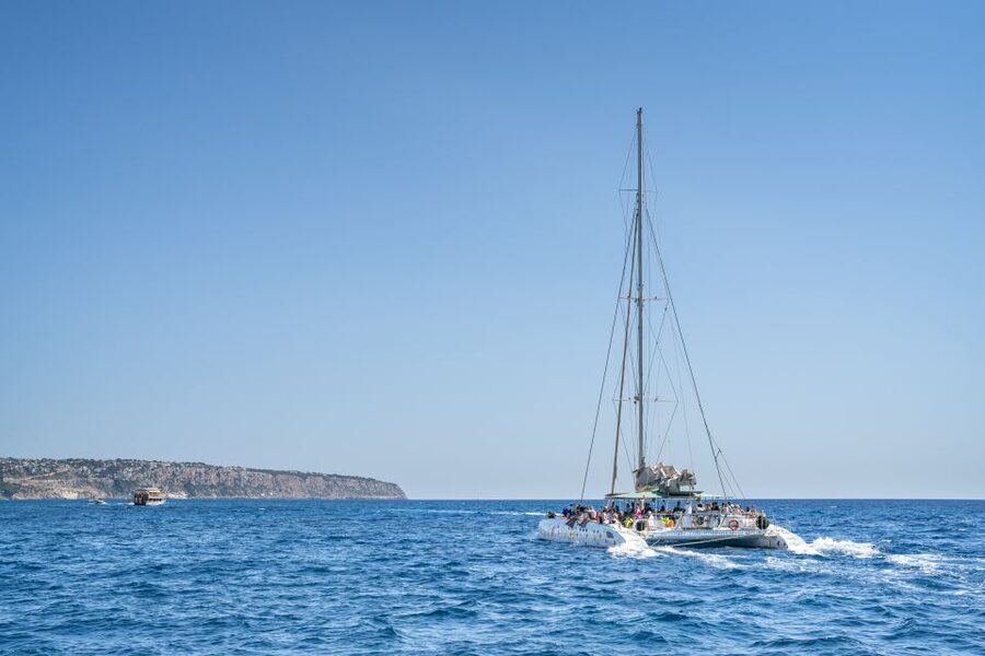 Palma de Mallorca: 5-Hour Catamaran Cruise with Lunch & Swim - Leaving Palma with the harbor in view