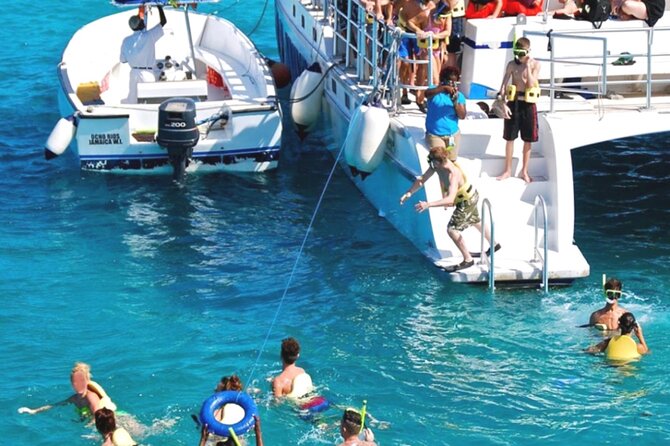 Party Catamaran and Snorkeling Tour in Montego Bay - What the four-hour cruise feels like