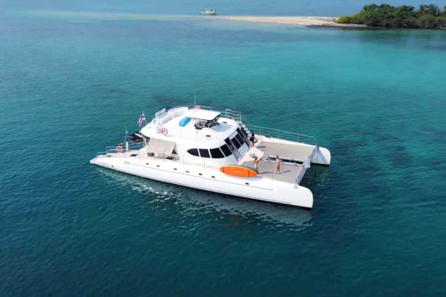 Pattaya: 3 Islands Day Tour on Catamaran with Buffet Lunch - A polished catamaran departure from Ocean Marina Jomtien