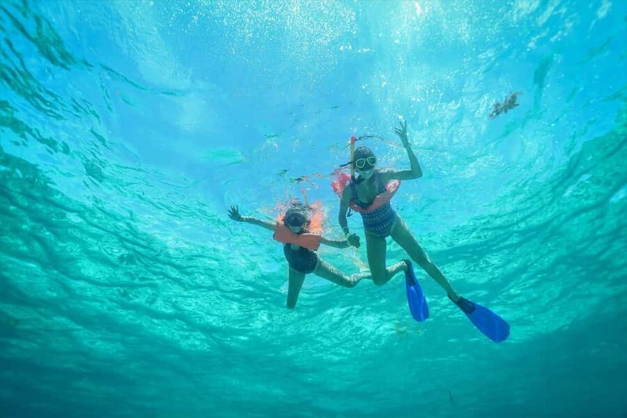 PDC: Isla Mujeres Catamaran Tour with Snorkeling - Ninety minutes in downtown Isla Mujeres