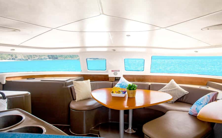 Phuket Catamaran Tour in Coral Island and Sunset Voyage - Laem Krating adds a rugged coastal view