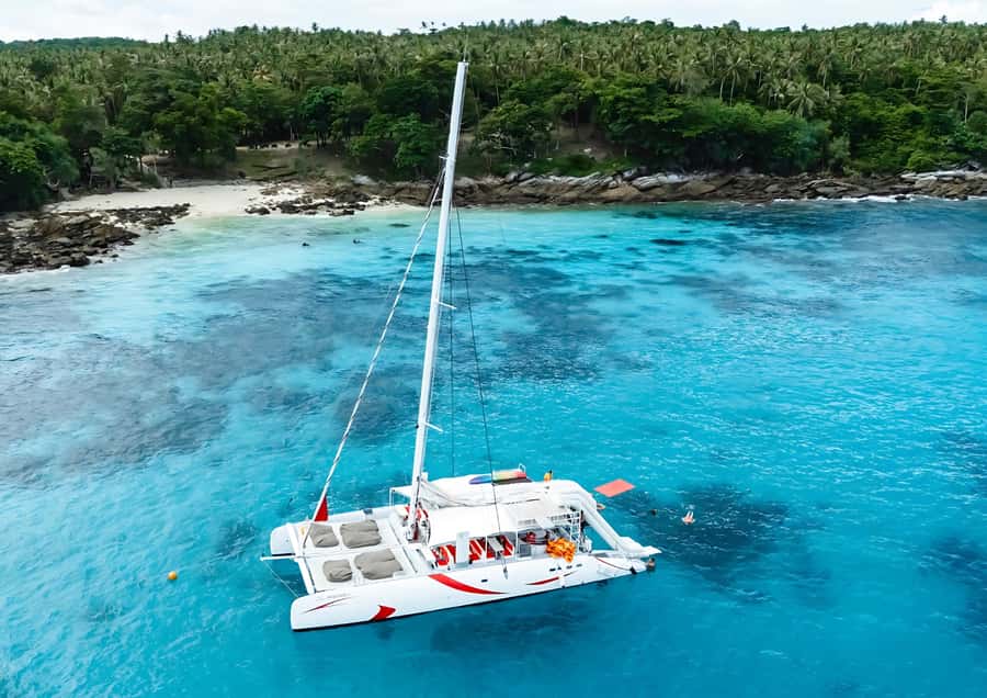 Phuket: Coral, Racha, Promthep Island Catamaran Trip & Lunch - Leaving Phuket by catamaran