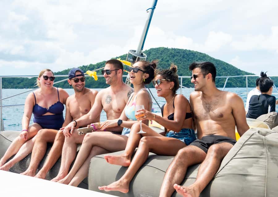 Phuket: Coral, Racha, Promthep Island Party Catamaran trip - Coral Island: your first swim and beach break