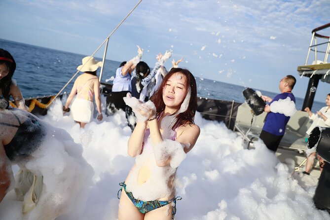 Phuket: Islands Hopping Catamaran Tour with Foam Party - Coral Island starts the water action