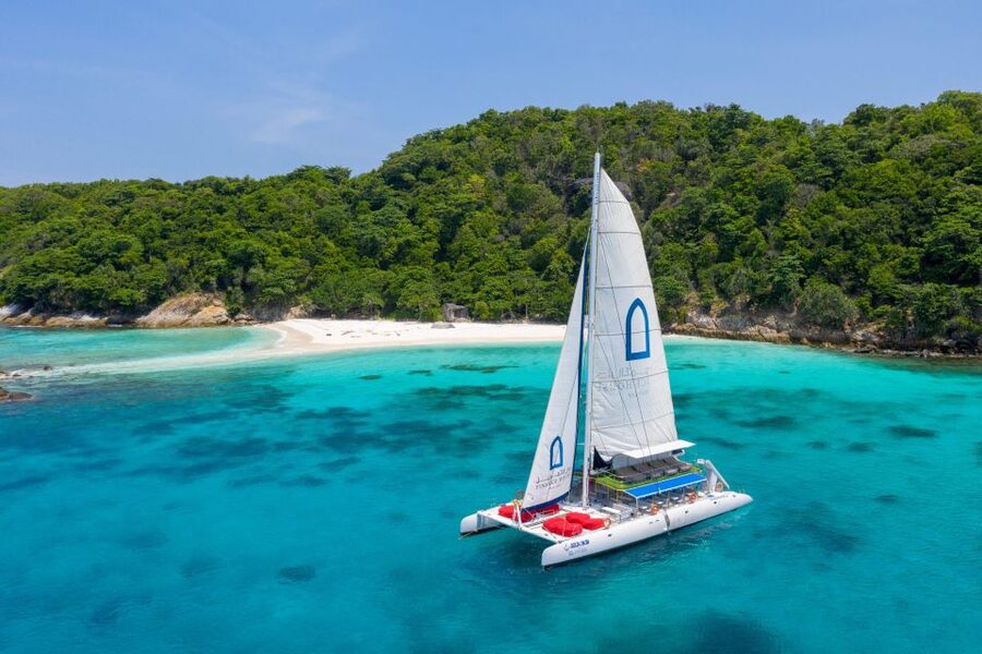 Phuket: Racha and Coral Island Catamaran Tour with Lunch - Lunch on the catamaran while Racha Island comes into view