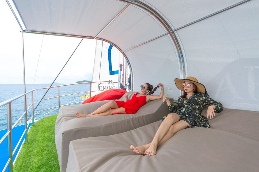 Phuket: Racha and Coral Island Catamaran Tour with Lunch - Coral Island: swimming, sand, and optional water sports