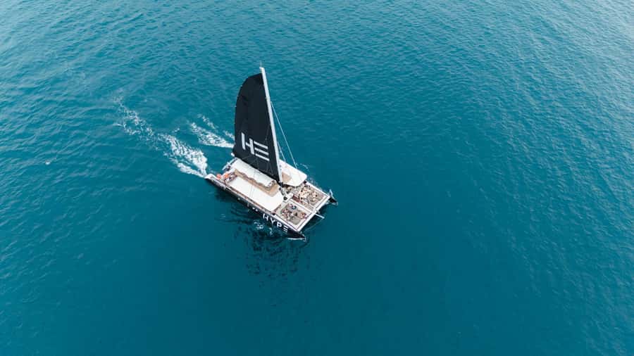 Phuket: Racha and Coral Island Sunset Catamaran Party Tour - Practical packing advice for eight hours outside