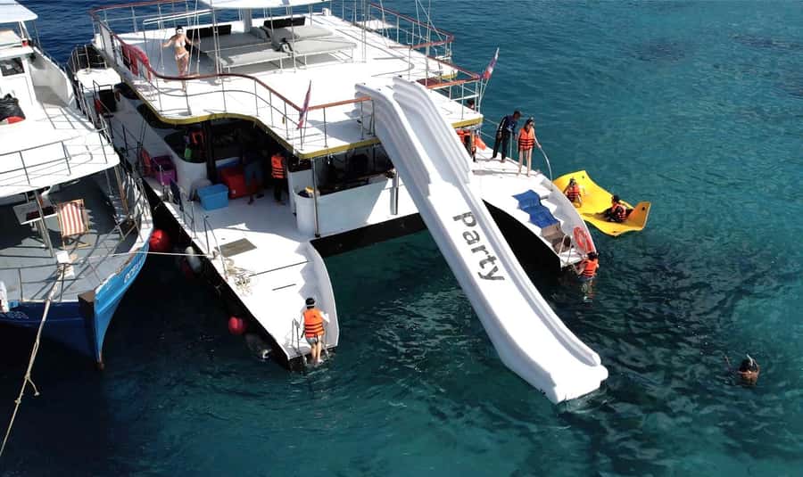 Phuket: Racha & Coral Island Catamaran Tour With Foam Party - The Archer turns a boat trip into the main event