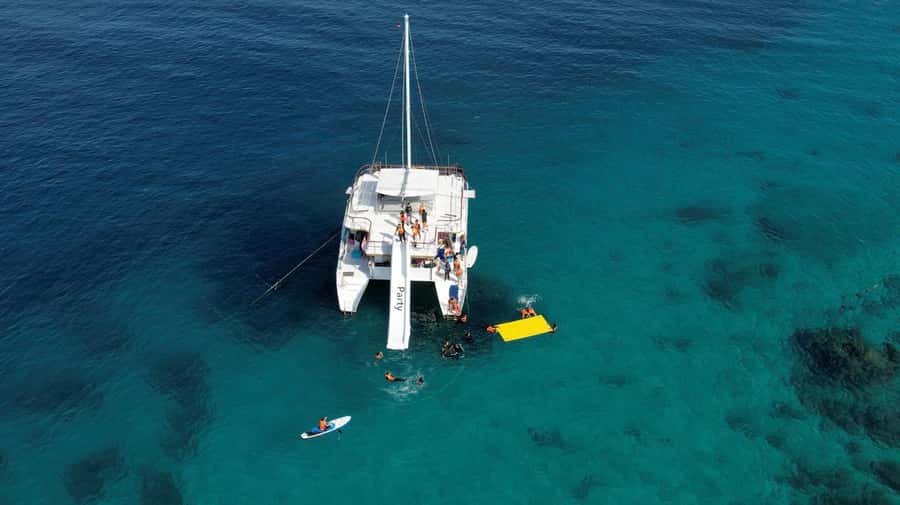 Phuket: Racha & Coral Island Catamaran Tour With Foam Party - Coral Island brings the first swim and lunch
