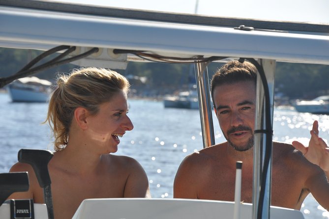 Playa Sa Roqueta Private Catamaran Trip - Swimming, snorkeling, and paddleboarding