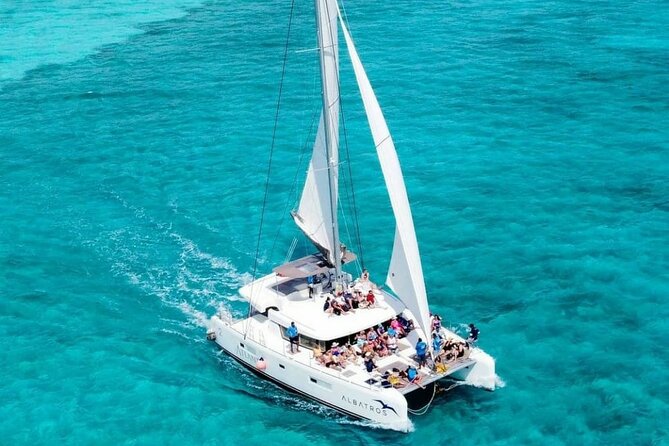 Plus Full Day Catamaran Tour to Isla Mujeres All Inclusive - A lively crew, with a schedule to match