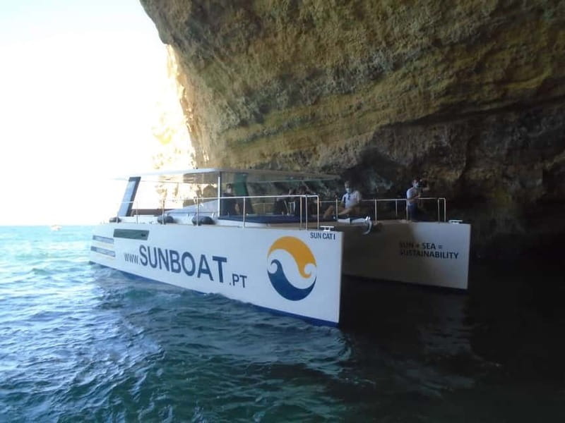 Portimão: Benagil Caves & Golden Coast Eco Catamaran Tour - Bar, restroom, shade, and music