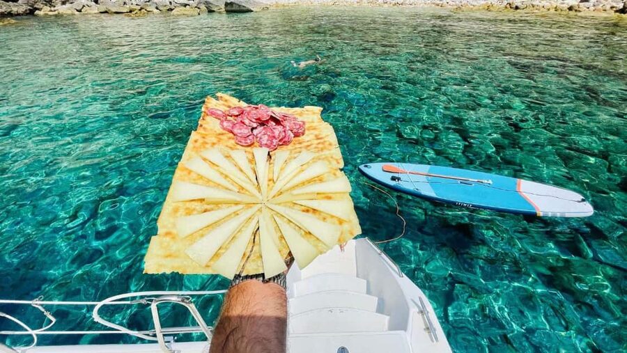 Porto Conte: Half-day catamaran tour with aperitif - Practical details before you reserve