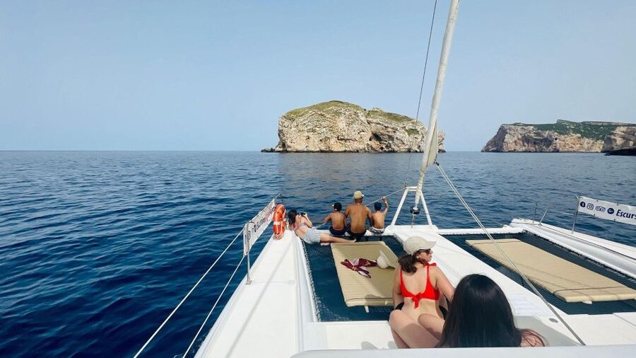 Porto Conte: Sunset catamaran excursion with aperitif - What the boat gives you for three hours