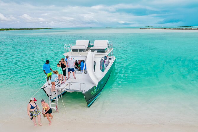Private 4 Hour Power Catamaran Excursion in Grace Bay - Cruising past Fort George Island and Pine Cay
