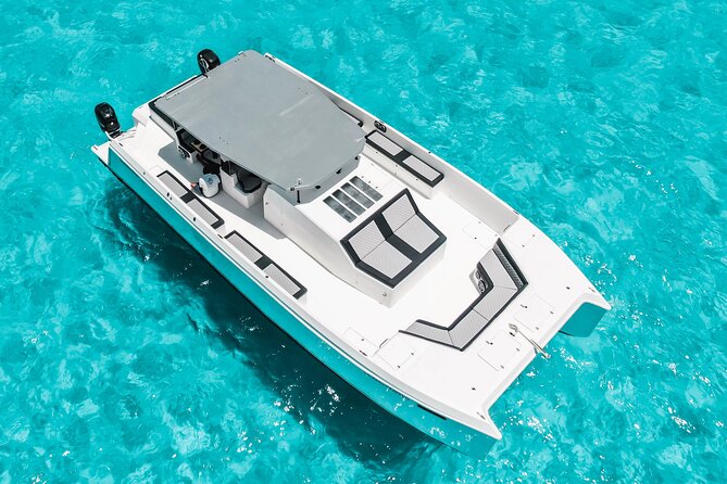 Private Atomic Catamaran Tour to Isla Mujeres - Setting out from Playa Tortugas