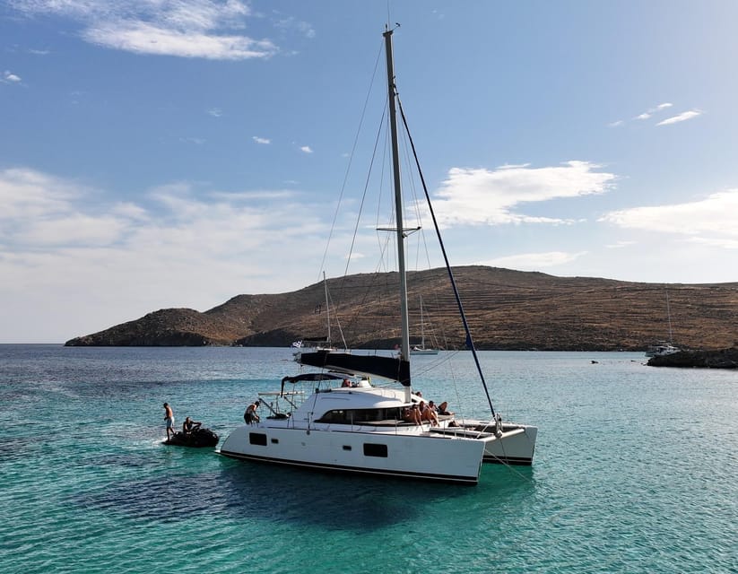 Private Catamaran Cruise Mykonos Delos with Meals & SUP - Greek Lunch Served While You Stay at Anchor