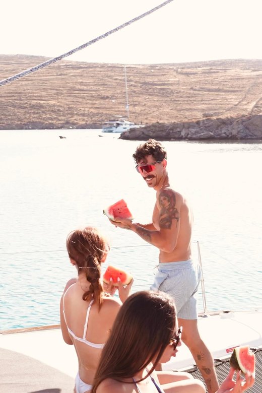 Private Catamaran Cruise Mykonos Delos with Meals & SUP - What $1,414 Means for a Group of Four