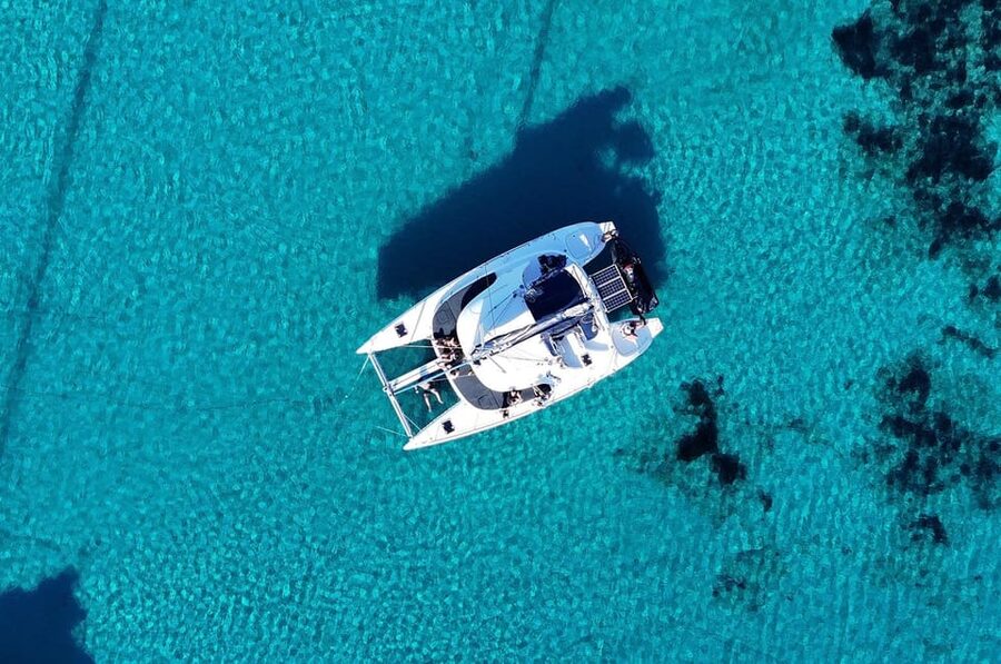 Private Catamaran Cruise Mykonos Delos with Meals & SUP - Rhenia Island and the Main Water Stop