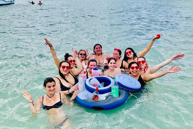Private Catamaran Cruise with Slide & unlimited drinks - The photographer and extra costs