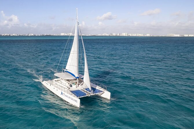 Private Catamaran from Cancun to Isla Mujeres | For up to 100 pp - Snorkeling at El Farito