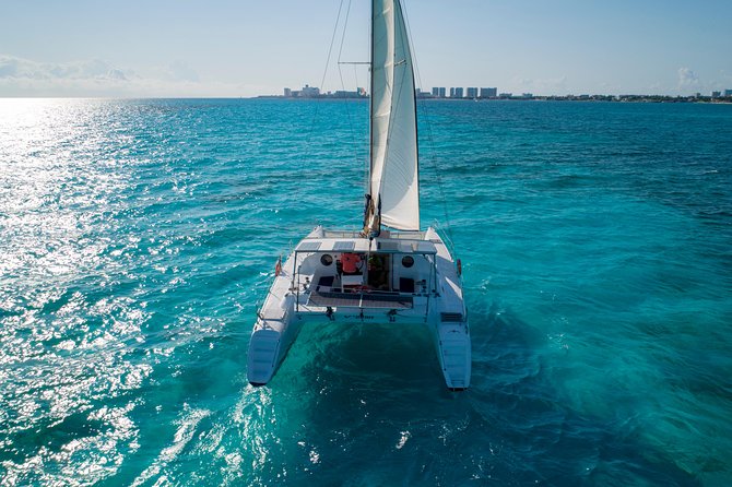 Private Catamaran from Cancun to Isla Mujeres | For up to 40 pp - Spinnaker sailing and the party atmosphere