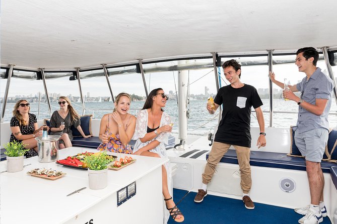 Private Catamaran Hire on Sydney Harbour - Passing the Opera House by boat