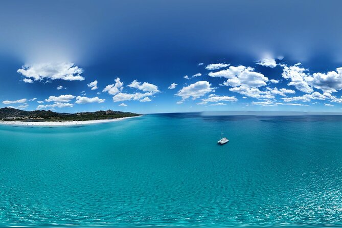 Private catamaran sailing trip around La Caletta -Berchida - Sardinia - Santa Lucia adds a second coastal setting