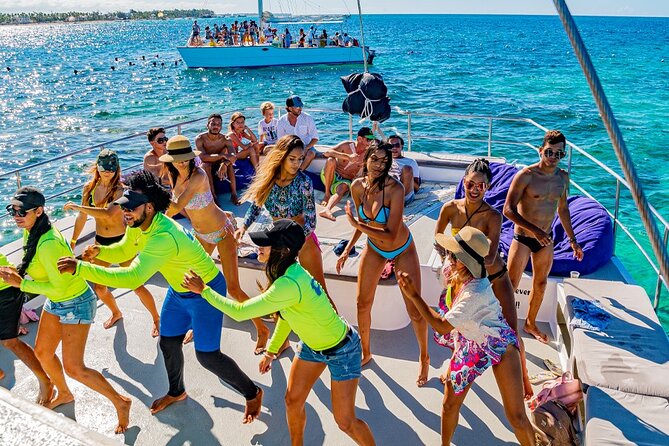 Private Catamaran Snorkeling Family Adventure - Music, dancing, fruit, and an open bar