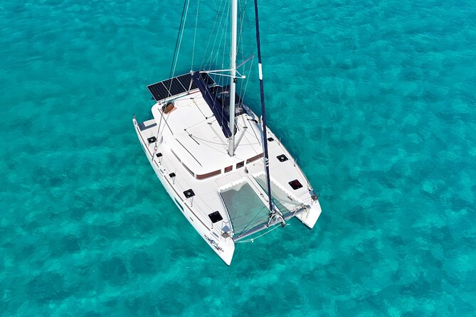 Private Catamaran Tour Super to Isla Mujeres - Drinks, music, and the mood on board